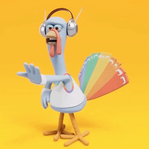 another turkey with rainbow feathers jamming in headphones